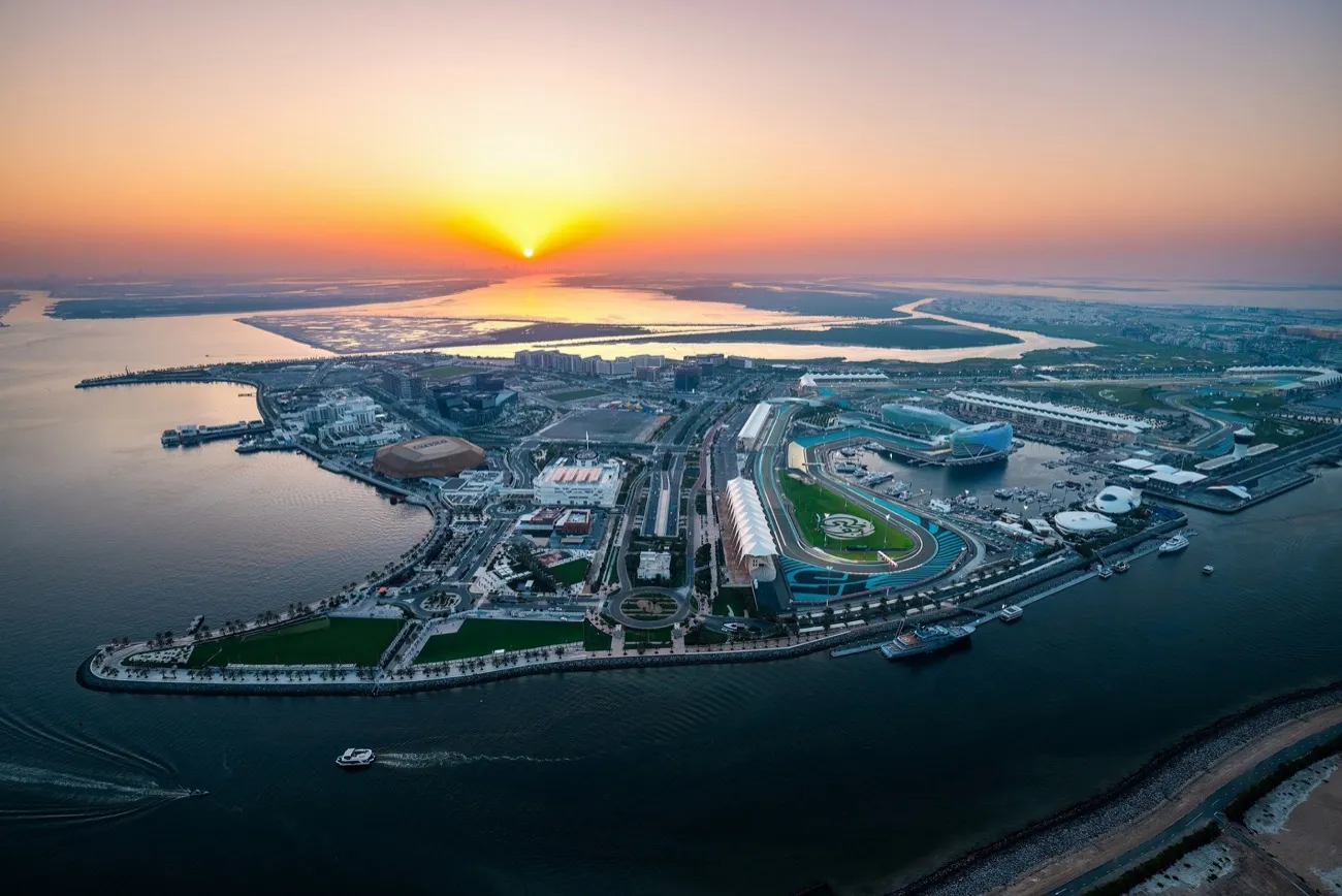 Aerial view of Yas Island at sunset, with Yas Marina Circuit and the marina